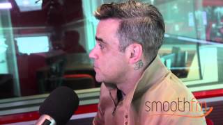 Robbie Williams chats to Richard Wilkins