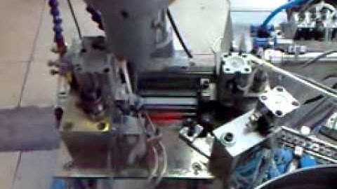Automatic tapping machine with bowl feeder