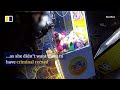 Men toppling claw machine ends up shattering glass