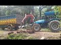 Crab tractor loading palm oil