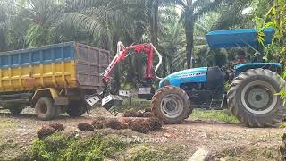 Crab tractor loading palm oil