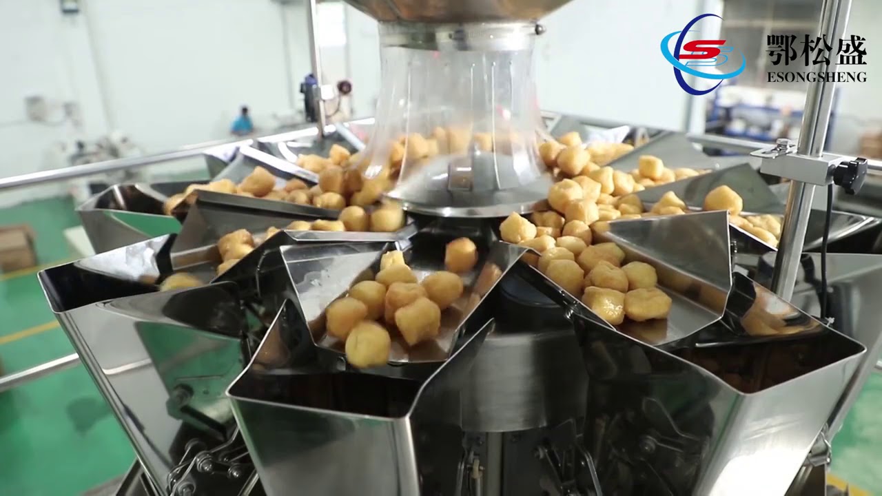 Multi-head weighing packing machine