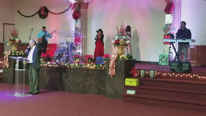 Pastor Pedro Aceves singing