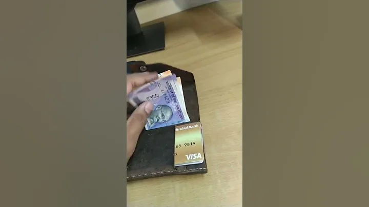 minimal wallet design with notes, I'd, credit card and coin slot