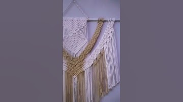 Handmade thread art is created by stitching, weaving, knotting, or wrapping threads to design.