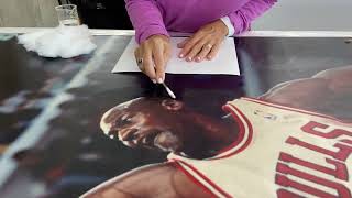 Surface Cleaning a Life-Sized Michael Jordan Poster