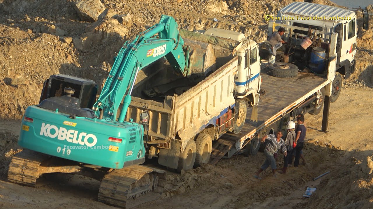 How to Load Dump Truck On Dump Trailer ? Excavator And Dump Truck - YouTube