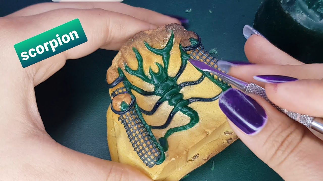 stellite scorpion sculpture artistique prothèse dentaire تقويم عقرب