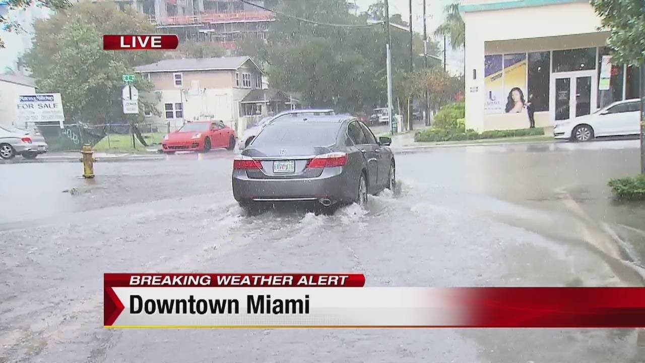 Heavy rain floods streets of downtown Miami YouTube