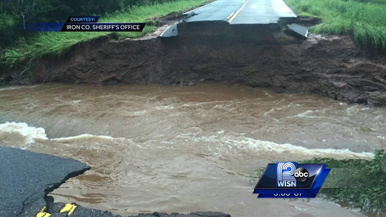 Floods wash out roads in Wisconsin and Minnesota - YouTube