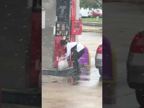 lady puts gas in plastic Bag