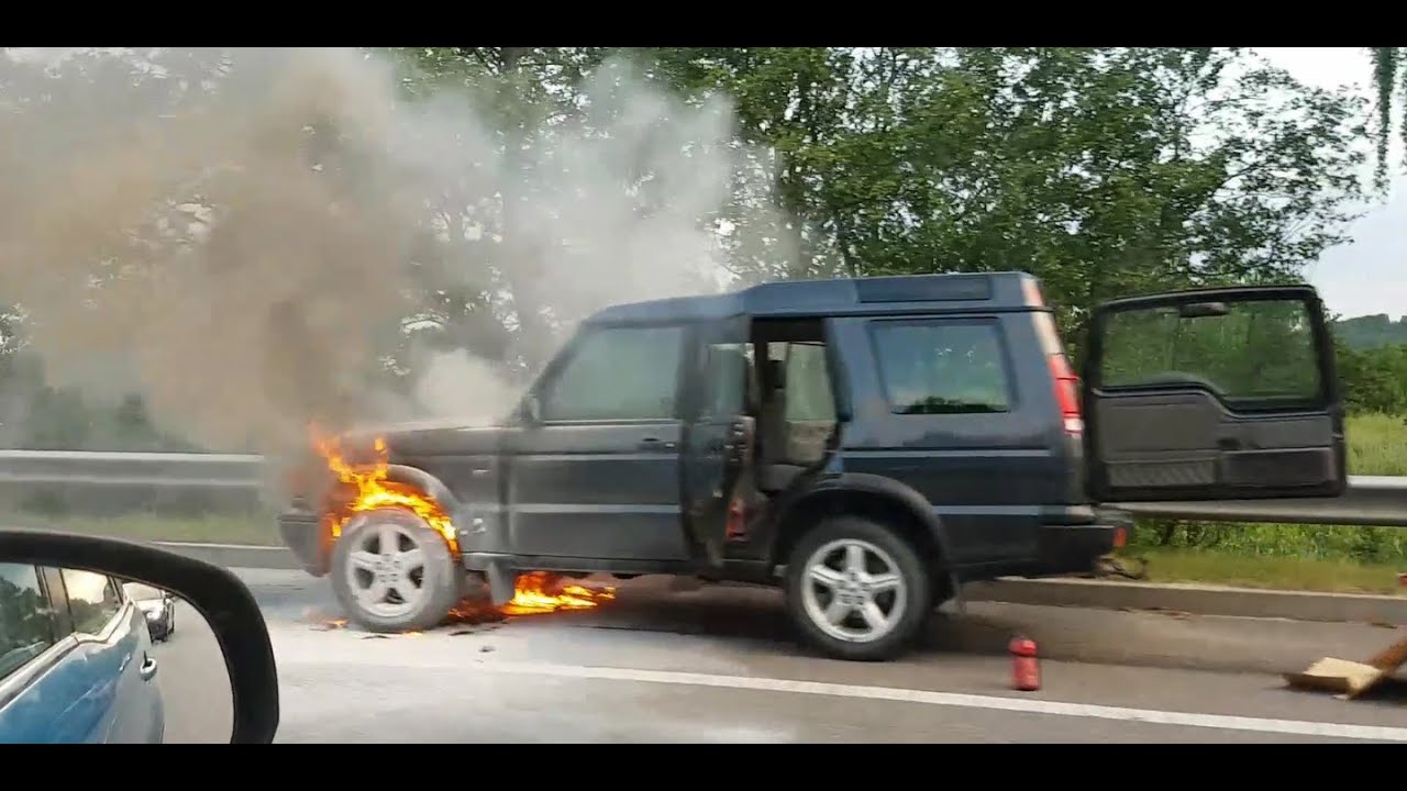 Land Rover burning on a motorway - YouTube