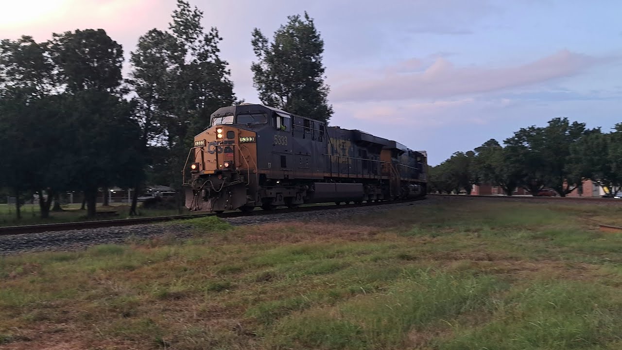 M682 Train Southbound with an ES40DC Leading a Long Train Off the A ...