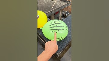 Experiment: Will a water balloon explode if it rolls down a tall building? 💥🎈 #balloon