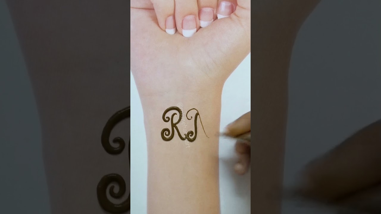 Very simple RN couple alphabet mehndi tattoo design by mk mehandi art 