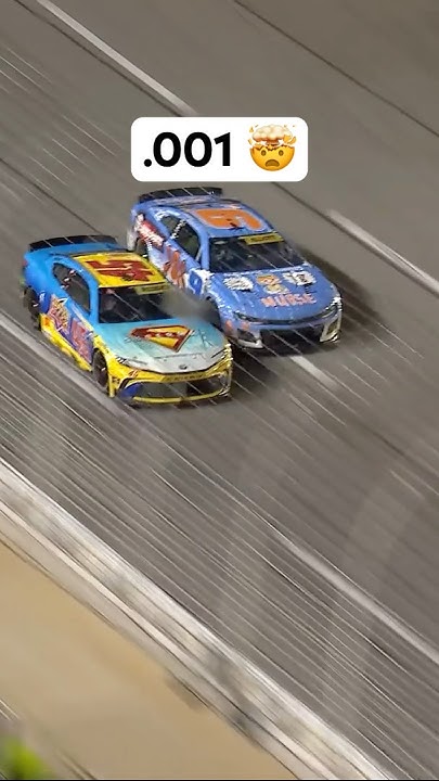 Tyler Reddick edges out Chase Elliott by .001 to win the stage!