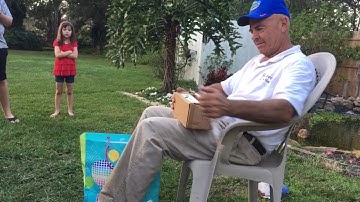 Giving my colorblind Papa EnChroma glasses