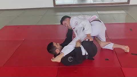 X - guard sweep from lapel guard