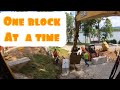 Building a large retaining wall with John Deere 120