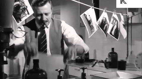 1960s Man Developing Photos in Dark Room, Photographer