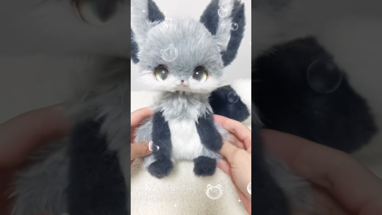 キツネのリアルなぬいぐるみ。オーク人形。動物的なアートドール