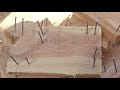 hammered 100 nails into wood simultaneously