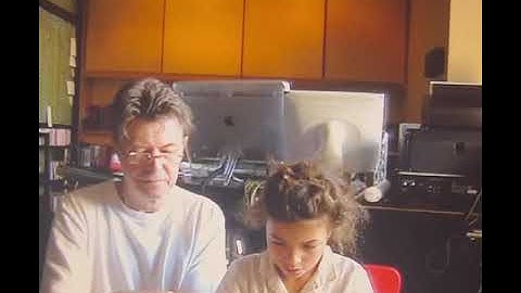 David Bowie and his daughter Lexi playing together