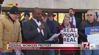 Federal workers protest at RDU over shutdown