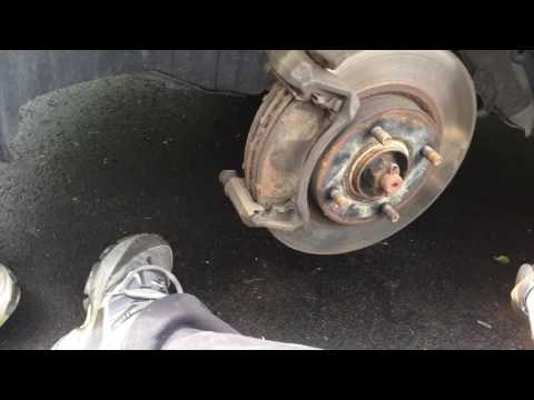 Change brake pads on a Nissan Versa brakepads brake replacement how to do it yourself quick