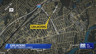 Springfield man charged with armed carjacking, one suspect still missing