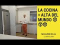 Cocina moderna con barra  y forma de U con silestone calacatta y gris expo