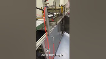 Abdominal pad folding machine