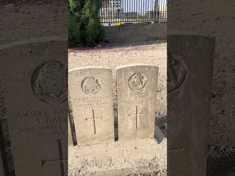 Still from the film Baghdad Northgate, the row of prisoner of war memorials