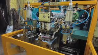 Celebrity 1 LITER DOUBLE HEAD DOUBLE STATION  AUTOMATIC PLASTIC BLOW MOLDING MACHINE HYDROPNEUMATIC. Profile