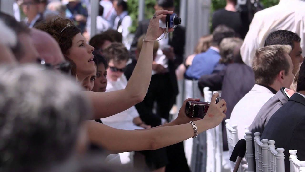 110 couples say 'I do' at Grand Pride Wedding - YouTube