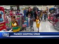 Padres take kids from Perkins Elementary Holiday Shopping