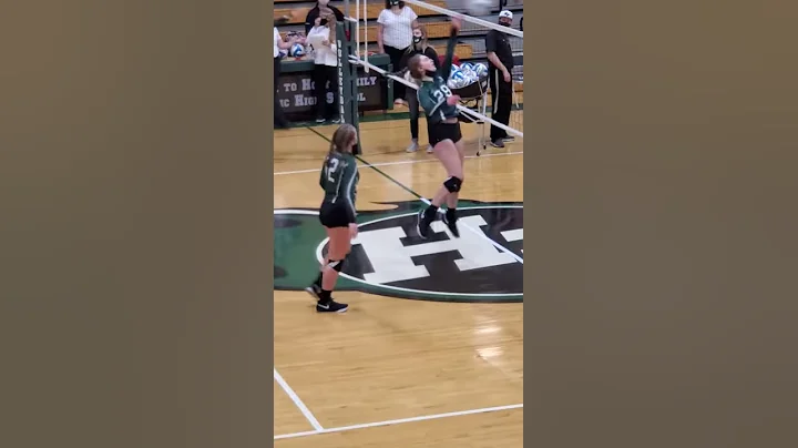 Holy Family VB Tamara Mackey warming up front row ...