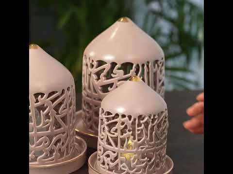 شموع إلكترونية بأحجام مختلفة باللون البنفسجي والذهبي من مجموعة جوار فخامة تضئ كل زاوية في منزلك