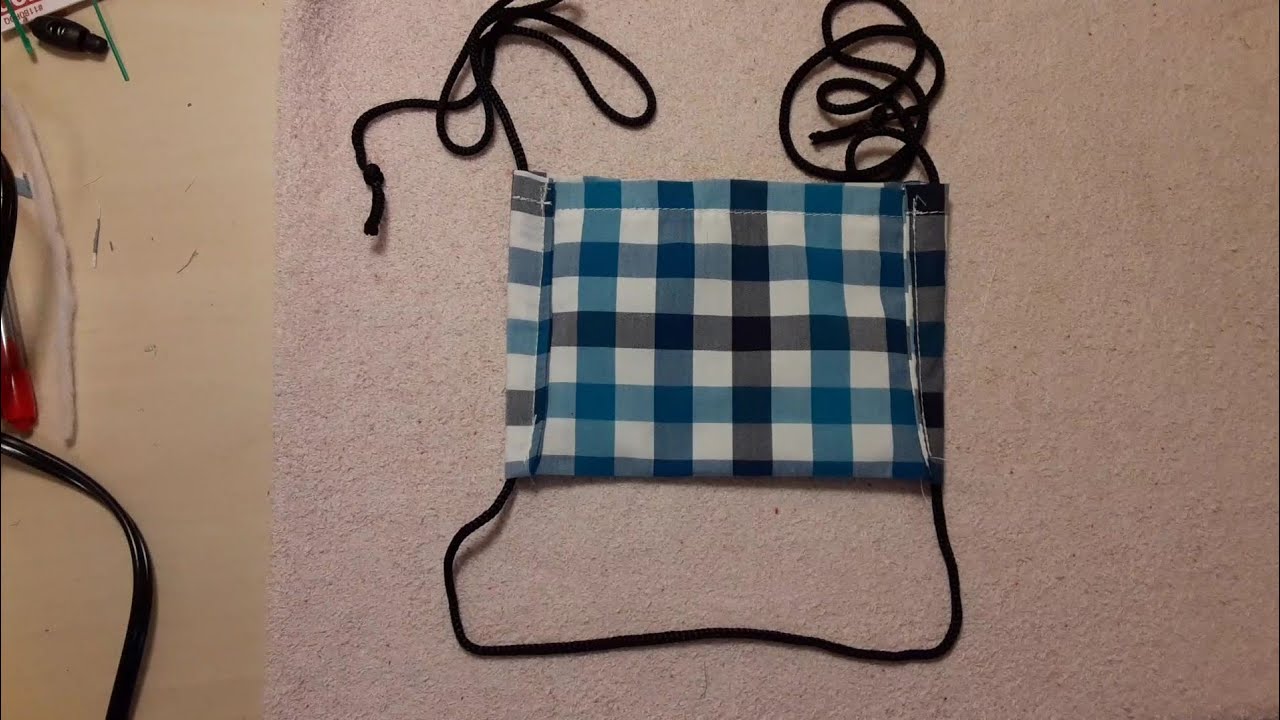 Adjustable paracord washable mask with filter pocket opening on top and