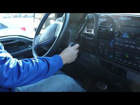 Video: Cum programați o cheie pentru un Ford f250 din 2003?