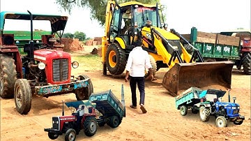 jcb 3dx xpert machine running working for loading mud in trolley eicher 380, massey 241 tractor