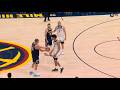 Nikola Jokic tries to reset the shot clock by giving the Wolves the ball and stealing it back