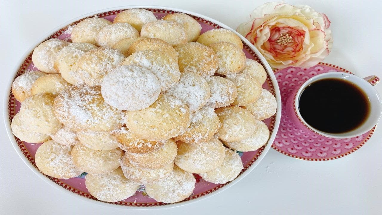 حضري 100 قطعة بسكويت بجوز الهند نمبر وان بكوب دقيق وبيضة وبمكون سري هيخلي البسكويت يدوب دوبان