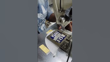 Back neck label attach by pattern tracker