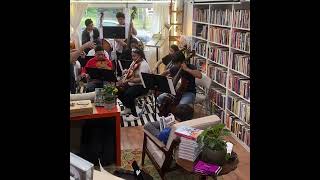 Coop High School Strings Ensemble visits the bookspace...