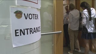 Fulton County election officials recounting votes