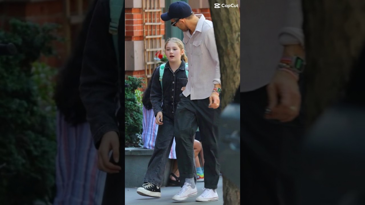 Ryan Reynolds escorts his eldest daughter James 