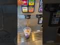 Mug root beer and Dr Pepper soda drink mix at Taco Bell soda fountain machine