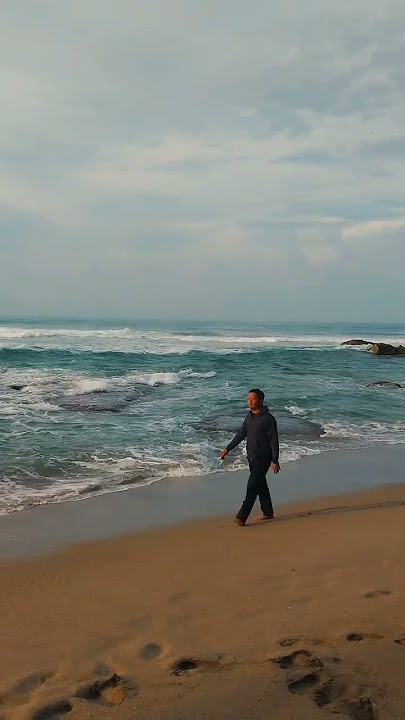 touring pantai goa langir, pantai sawarna dan karang bokor.
