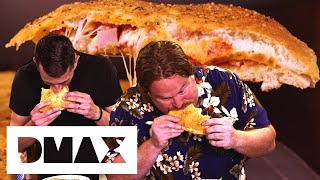 Can Casey Keep Up With His Eating Partner In This EIGHT POUND Stuffed Pizza Challenge? | Man V Food